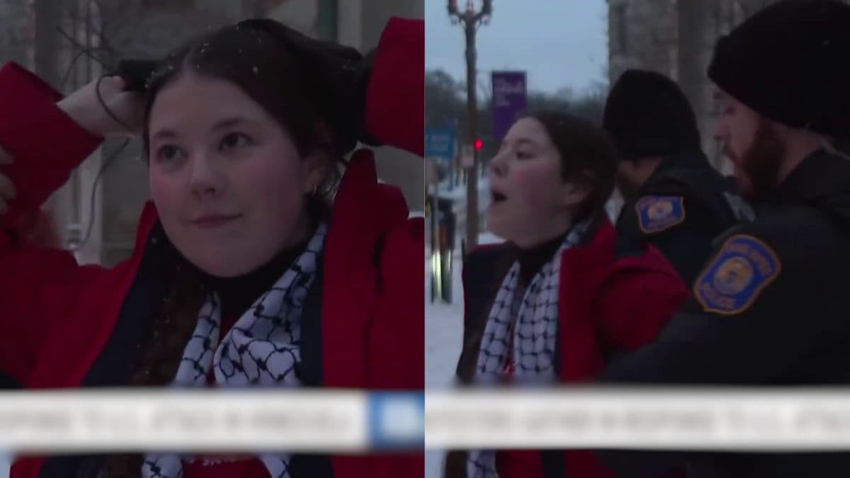 protester arrested mid interview.jpg