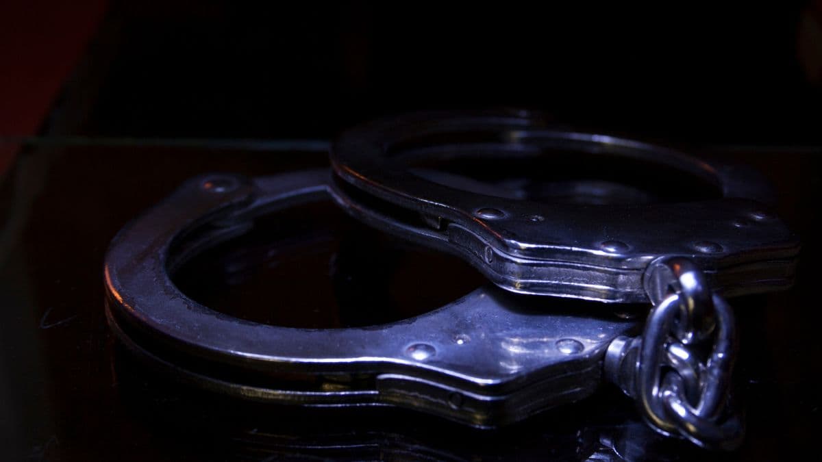 Johor police arrest two local men linked to loan shark arson and intimidation ring.jpg