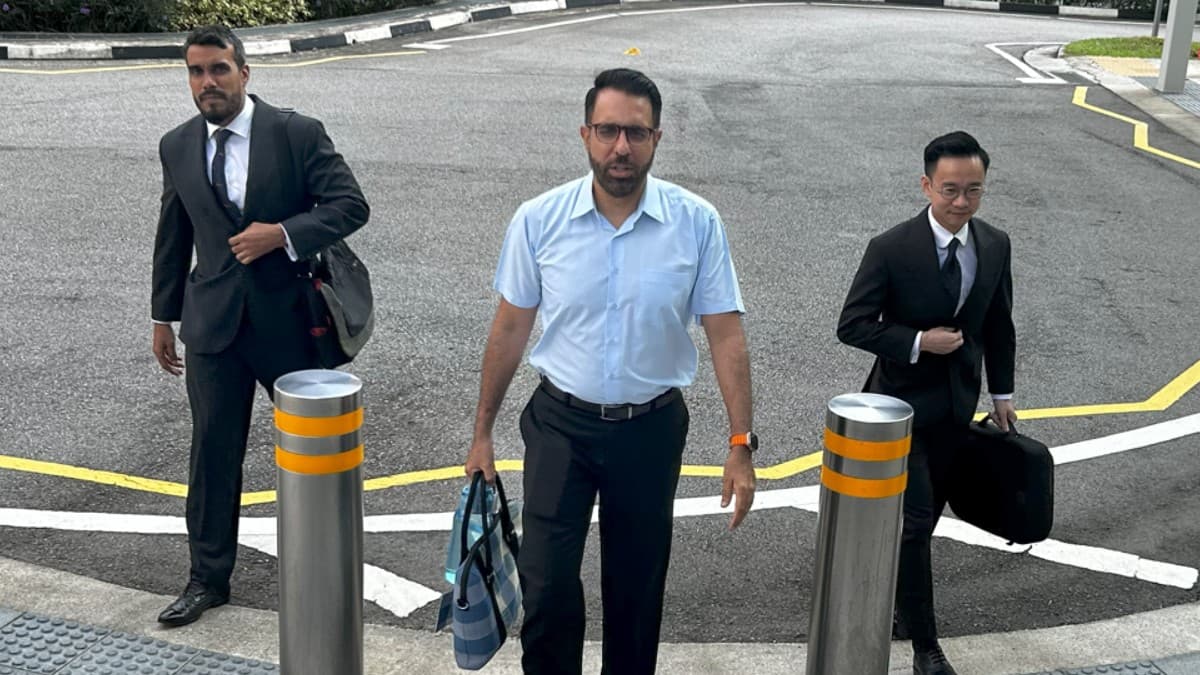 Pritam SIngh and lawyer.jpg